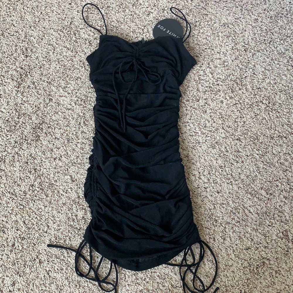 BRAND NEW Size XS Face It Mini Dress Black shown on in a size S